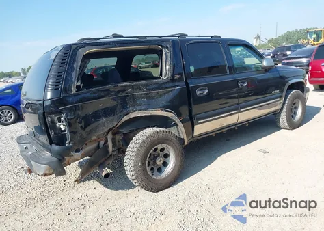 2000 Chevrolet Suburban 1500 Ls z USA, uszkodzony, nr VIN 3GNFK16T3YG200512